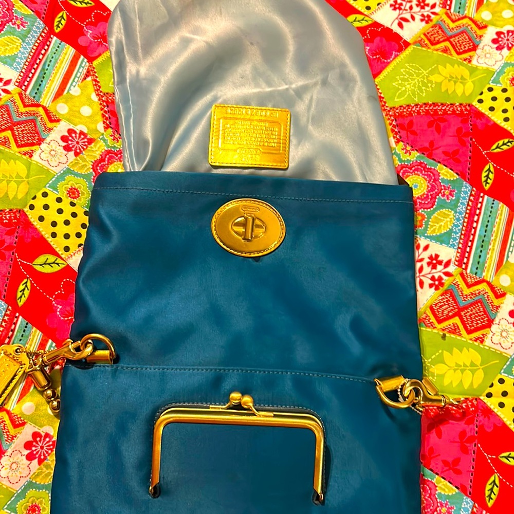 This is an authentic coach clutch bag